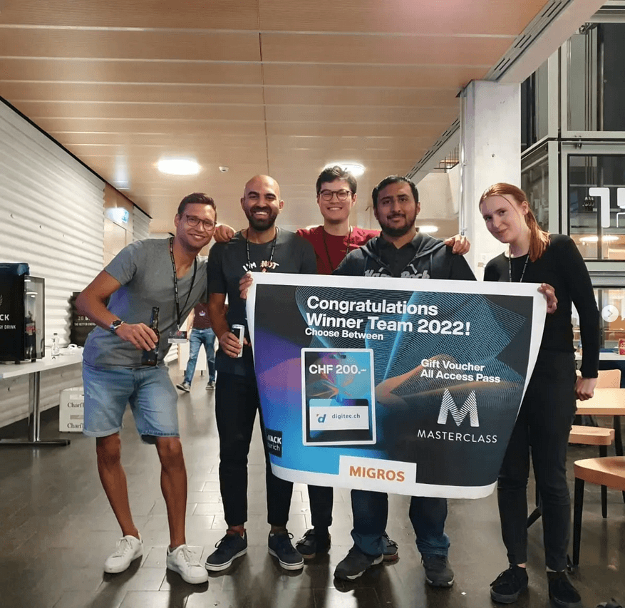 The 5-person team after winning the Migros challenge. HackZurich 2022, Zurich.